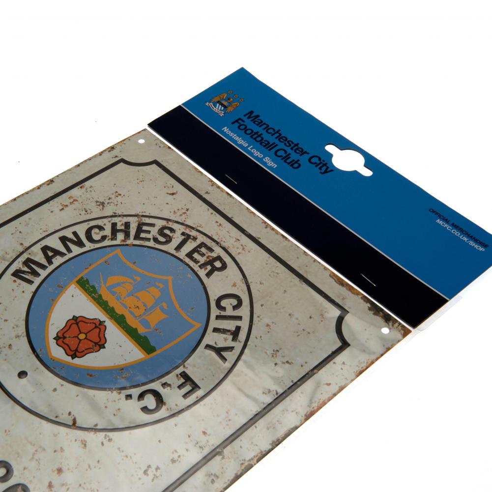 https://imageoffloads.taylorsmerchandise.com/wp-content/uploads/84379-Manchester-City-FC-Retro-Logo-Sign-2.jpg