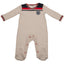 England FA Sleepsuit World Cup 82 12-18 Mths LKT Sport This long sleeved baby sleepsuit features England's traditional white home coloursDesign inspired by the 1982 world cup kit with an embroidered crestSoft comfortable fit with press stud fasteningMain: