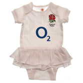 England RFU Tutu 6/9 mths PC LKT Sport This short sleeved tutu bodysuit features a double frill skirt designDesign inspired by the 2023-24 season kit with an embroidered crest and printed sponsorSoft comfortable fit with press stud fasteningMain: 100% Cot