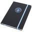 Manchester City FC Classic Notebook LKT Sport Premium black faux leather hardback notebook with a sky blue embossed Man City CrestRuled pages featuring a Man City crest and a handy bookmarkComplete with an elastic closureOfficial licensed productApprox 14
