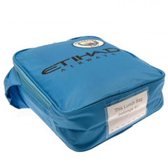 Manchester City FC Kit Lunch Bag LKT Sport Home shirt design lunch bag featuring Etihad Airways text and club crestDouble zipped opening for easy accessWith carry handle and name tagWipe clean polyesterOfficial licensed productApprox 29cm x 24cm x 7cm Lun
