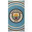 Manchester City FC Pulse Towel LKT Sport Large soft to touch 100% cotton velour beach towel Features a pulse design with a central large crest Official licensed product Approx 140cm x 70cm (55in x 28in) In a display packet Beach Towels