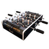 Newcastle United FC 20 inch Football Table Game LKT Sport Table top, football game with a black pitch design6 players per team in black or whiteA score indicator on each sideComplete with two plastic ballsSteel, easy roll play rods with soft gripsOfficial