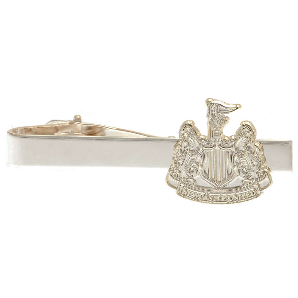 Newcastle United FC Silver Plated Tie Slide LKT Sport Classic design tie slide in a mirror finishSilver Plated pin featuring the Newcastle crestWith a crocodile clip backOfficial licensed productApprox 50mm x 12mm Tie Clips
