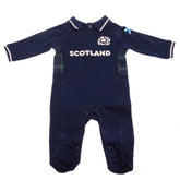 Scotland RU Sleepsuit 9/12 mths GT LKT Sport This long sleeved baby sleepsuit features the famous navy and white colours of Scotland RUDesign inspired by the 2023-24 season kit with an embroidered crest and Scotland printSoft comfortable fit with press st