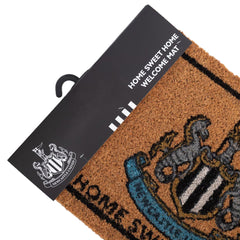 https://imageoffloads.taylorsmerchandise.com/wp-content/uploads/TM-04253-Newcastle-United-FC-Doormat-2.jpg