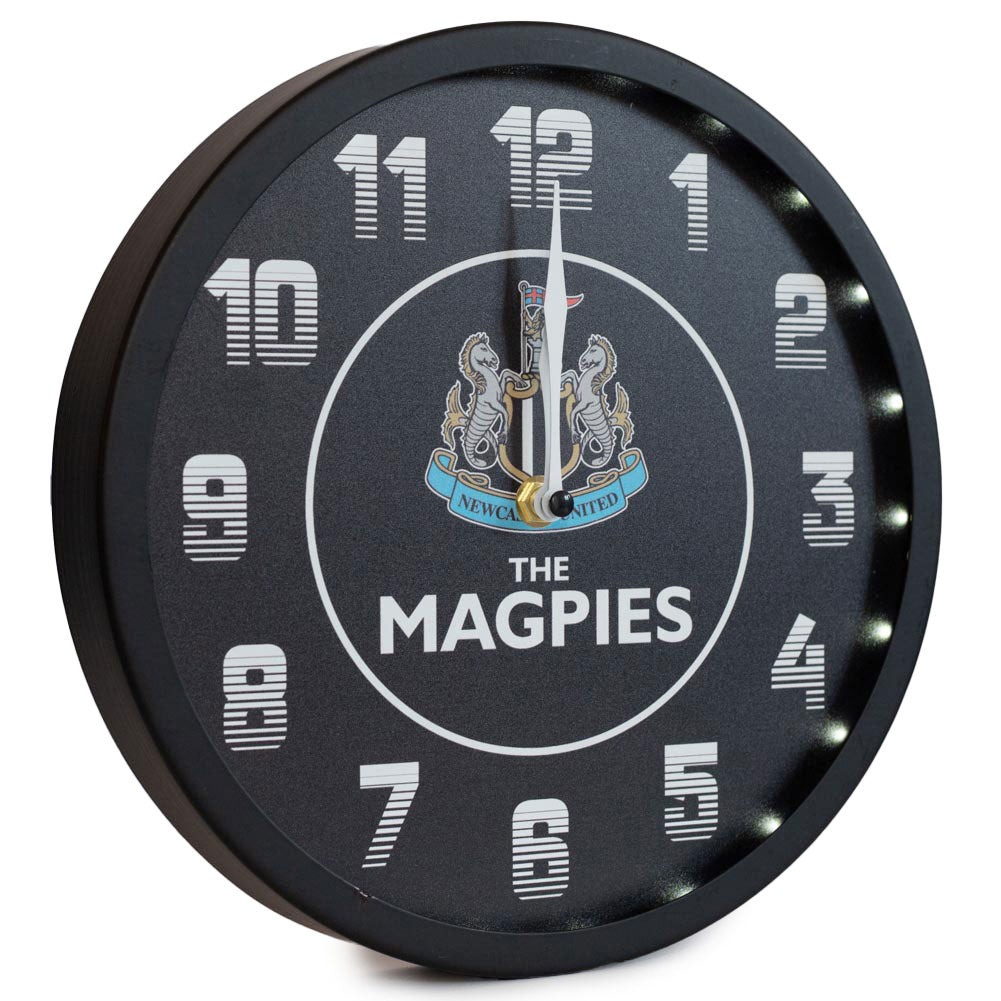 https://imageoffloads.taylorsmerchandise.com/wp-content/uploads/TM-04265-Newcastle-United-FC-Metallic-Wall-Clock-Black-2.jpg