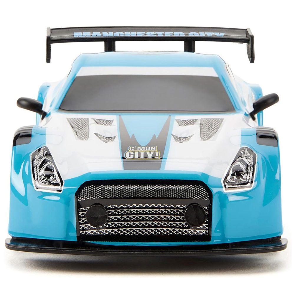 https://imageoffloads.taylorsmerchandise.com/wp-content/uploads/TM-04380-Manchester-City-FC-Radio-Control-Sportscar-1-24-Scale-2.jpg