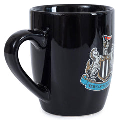https://imageoffloads.taylorsmerchandise.com/wp-content/uploads/TM-04466-Newcastle-United-FC-Shaped-Mug-3.jpg