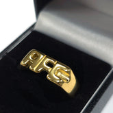 https://imageoffloads.taylorsmerchandise.com/wp-content/uploads/TM-06424-Arsenal-FC-18ct-Gold-Plated-on-Silver-AFC-Ring.jpg