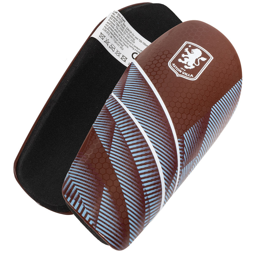 https://imageoffloads.taylorsmerchandise.com/wp-content/uploads/TM-06601-Aston-Villa-FC-Fuse-Shin-Pads-Kids-1.jpg