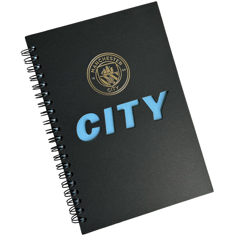 https://imageoffloads.taylorsmerchandise.com/wp-content/uploads/TM-06752-Manchester-City-FC-A5-Cut-Out-Notebook.jpg