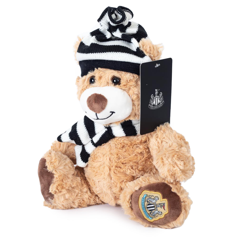 https://imageoffloads.taylorsmerchandise.com/wp-content/uploads/TM-07408-Newcastle-United-FC-Hat-Scarf-Charlie-Bear-4.jpg