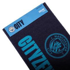 https://imageoffloads.taylorsmerchandise.com/wp-content/uploads/TM-07420-Manchester-City-FC-Doormat-2.jpg