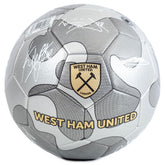 West Ham United FC Camo Sig Football LKT Sport High spec metallic finish 32 panel synthetic footballStriking silver colour featuring the Hammers crest and official player signature prints in whiteSuitable for 14 yrs and olderOfficial licensed productSize