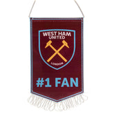 West Ham United FC No.1 Fan Mini Pennant LKT Sport Satin look irons #1 fan design pennantFeaturing the Irons logo on a claret backgroundFinished with white tassels and hanging stringIdeal for your car or windowOfficial licensed productApprox 16cm x 10cm F