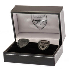 Arsenal FC Black IP Cufflinks LKT Sport Stainless steel crest shaped cufflinks coated in a black Ion PlatingFeaturing a highly detailed formed Arsenal crestOn a bullet back fixingOfficial licensed productApprox 20mm x 16mm Cufflinks