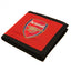 Arsenal FC Canvas Wallet LKT Sport Red wallet with black trim featuring full colour Arsenal club crest Internal window compartment and 2 zipped pockets 9 additional separate internal compartments Wipe clean polyester Official licensed product Approx 11cm