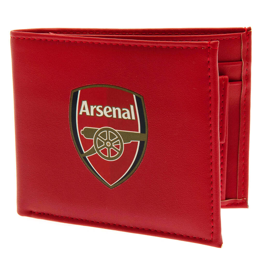Arsenal FC Coloured PU Wallet LKT Sport Coloured PU wallet featuring a large printed club crest3 card slots, a window slot and 2 note pocketsChange pocket with secure stud fastener2 additional compartmentsOfficial licensed productApprox 11cm x 9cm Wallets
