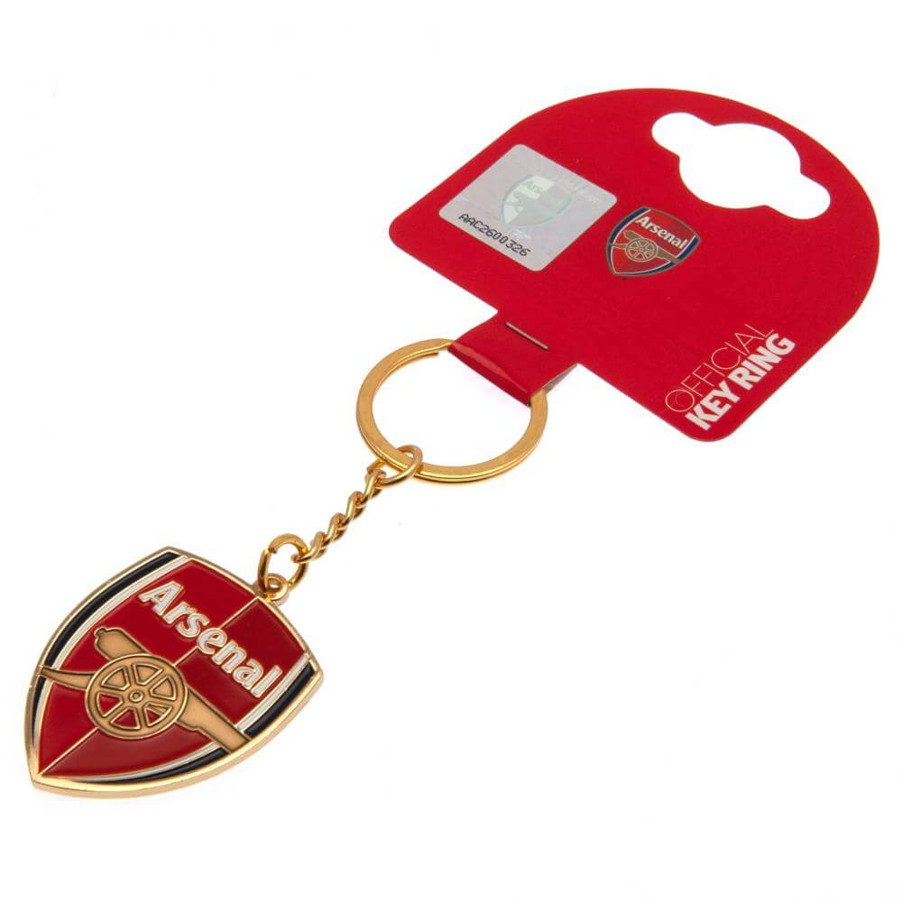Arsenal FC Crest Keyring LKT Sport Metal crest shaped keyring with chain and split ringDie stamped design with full colour enamel infillMetal alloy with gold style finishOfficial licensed productApprox 40mm x 40mm Keychains