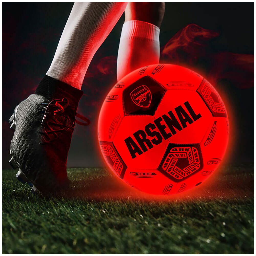 Arsenal FC LED Glow Football LKT Sport Orange LED glow 32 panel footballFeaturing a black crest and Arsenal text30 hours of continuous light up fun!Bounce activated with auto turn offBatteries included, fill 7.5-8.5 PSI for optimal bounceSuitable for 14 y