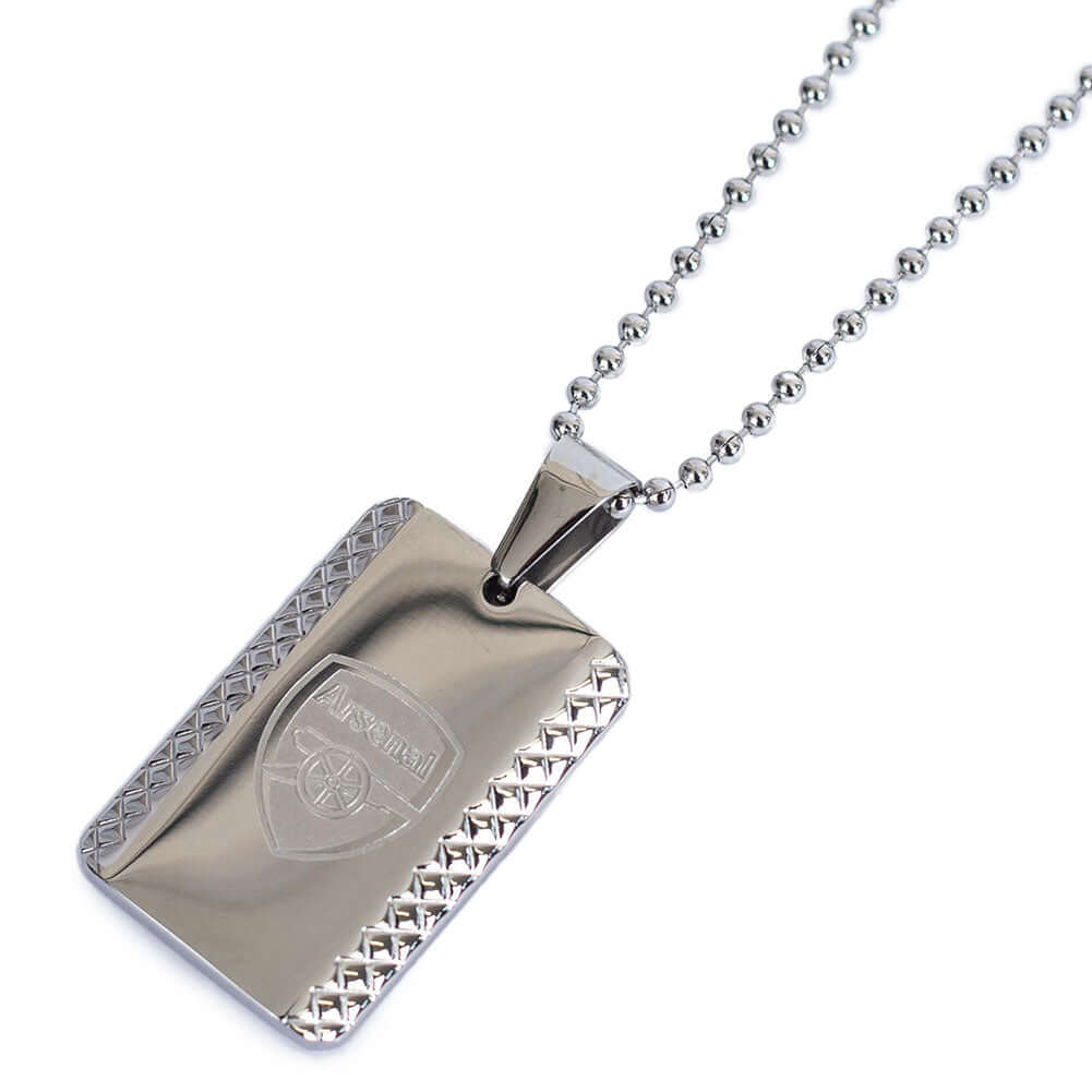 Arsenal FC Patterned Dog Tag & Chain LKT Sport Patterned design stainless steel dog tag and ball chainChrome finish and engraved with the Arsenal crestOfficial licensed productChain approx 50cm (20in)Dog tag approx 30mm x 20mm Necklaces