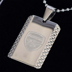 Arsenal FC Patterned Dog Tag & Chain LKT Sport Patterned design stainless steel dog tag and ball chainChrome finish and engraved with the Arsenal crestOfficial licensed productChain approx 50cm (20in)Dog tag approx 30mm x 20mm Necklaces