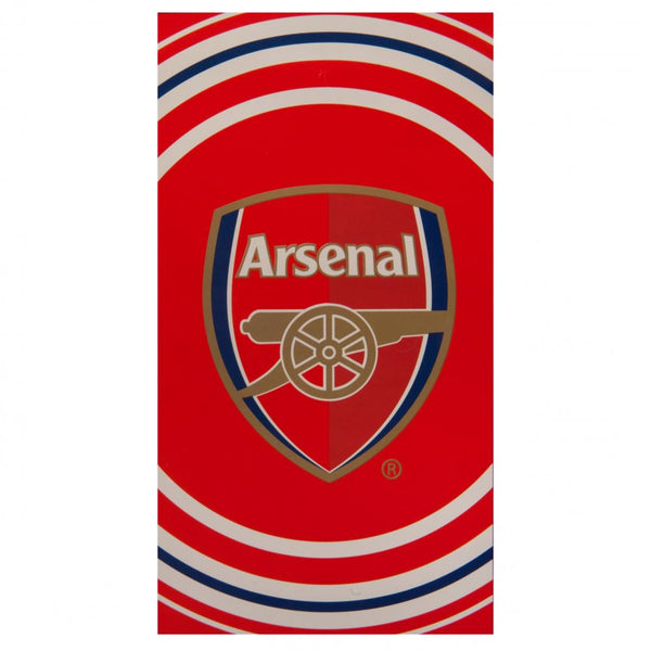 Arsenal FC Pulse Towel LKT Sport Large soft to touch 100% cotton velour beach towel Features a pulse design with a central large crest Official licensed product Approx 140cm x 70cm (55in x 28in) In a display packet Beach Towels