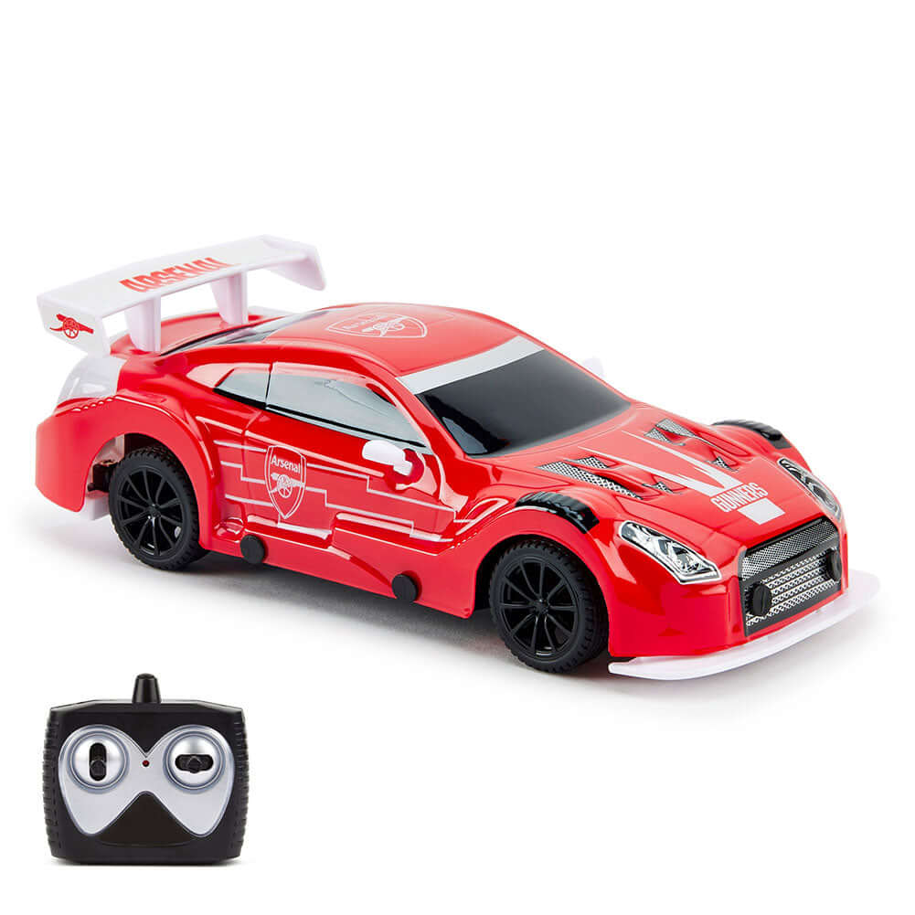 Arsenal FC Radio Control Sportscar 1:24 Scale LKT Sport Sleek and streamlined sportscar with iconic style brandingComplete with Arsenal FC crests on the roof and doorsIncludes an oversized spoiler on the rear for stability and speedWorking spring suspensi