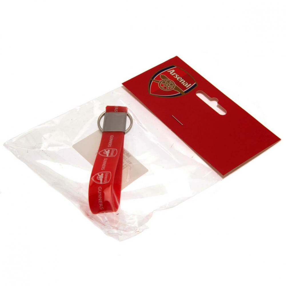Arsenal FC Silicone Keyring LKT Sport Silicone strap keyring with silver colour metal band and split ringVibrant red strap with crest and gunners designOfficial licensed productApprox 10cm x 1.5cm Keychains