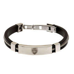 Arsenal FC Silver Inlay Silicone Bracelet LKT Sport Stylish black silicone bracelet with a silver colour rope insertWith a stainless steel crest plate featuring the club logoStainless steel deployment claspOfficial licensed productApprox 20cm x 1cm Bracel
