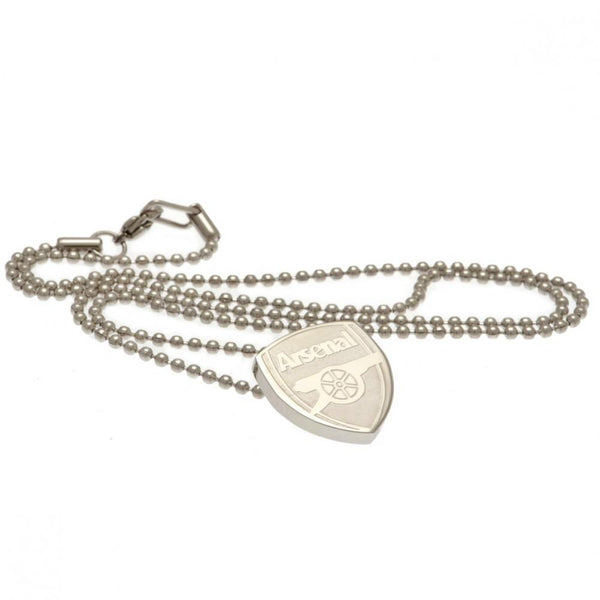 Arsenal FC Stainless Steel Pendant & Chain LKT Sport Stainless steel crest shaped pendant with ball chain Chrome finish Arsenal crest with engraved detail Official licensed product Chain approx 50cm (19in) Pendant approx 15mm x 20mm Presented in a gift bo