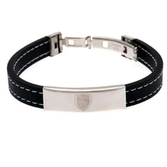 Arsenal FC Stitched Silicone Bracelet LKT Sport Black silicone bracelet with white stitching detailFeaturing a stainless steel crest plate featuring the club logoStainless steel deployment claspOfficial licensed productApprox 20cm x 1cm Bracelets