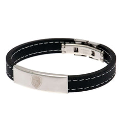 Arsenal FC Stitched Silicone Bracelet LKT Sport Black silicone bracelet with white stitching detailFeaturing a stainless steel crest plate featuring the club logoStainless steel deployment claspOfficial licensed productApprox 20cm x 1cm Bracelets