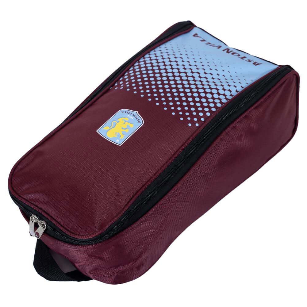 Aston Villa FC Fade Boot Bag LKT Sport Fade design boot bag featuring a full colour club crestLarge double zipped opening for easy accessWipe clean polyesterOfficial licensed productApprox 35cm x 18cm x 12cm Soccer Bags & Carriers