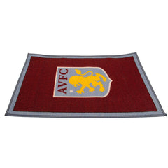 Aston Villa FC Rug LKT Sport Bright colourful bedroom rug featuring a large central club crestMade from 100% polyamide with a non-slip backingMachine washableOfficial licensed productApprox 80cm x 50cm Rugs
