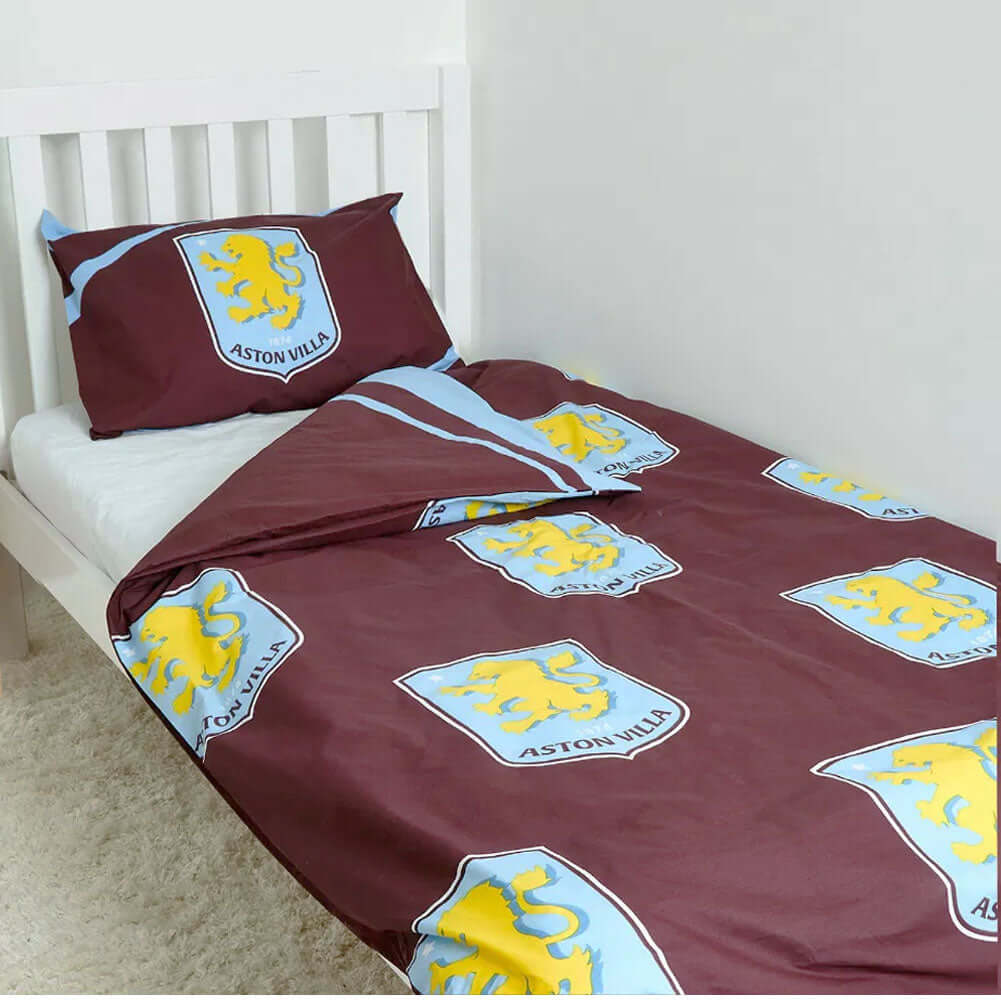 Aston Villa FC Single Duvet Set LKT Sport Vibrant claret and blue reversible duvet cover with a large Villa crestPillowcase features a large full colour club crestMulti crest design on the reverse52% polyester 48% cotton machine washableOfficial licensed