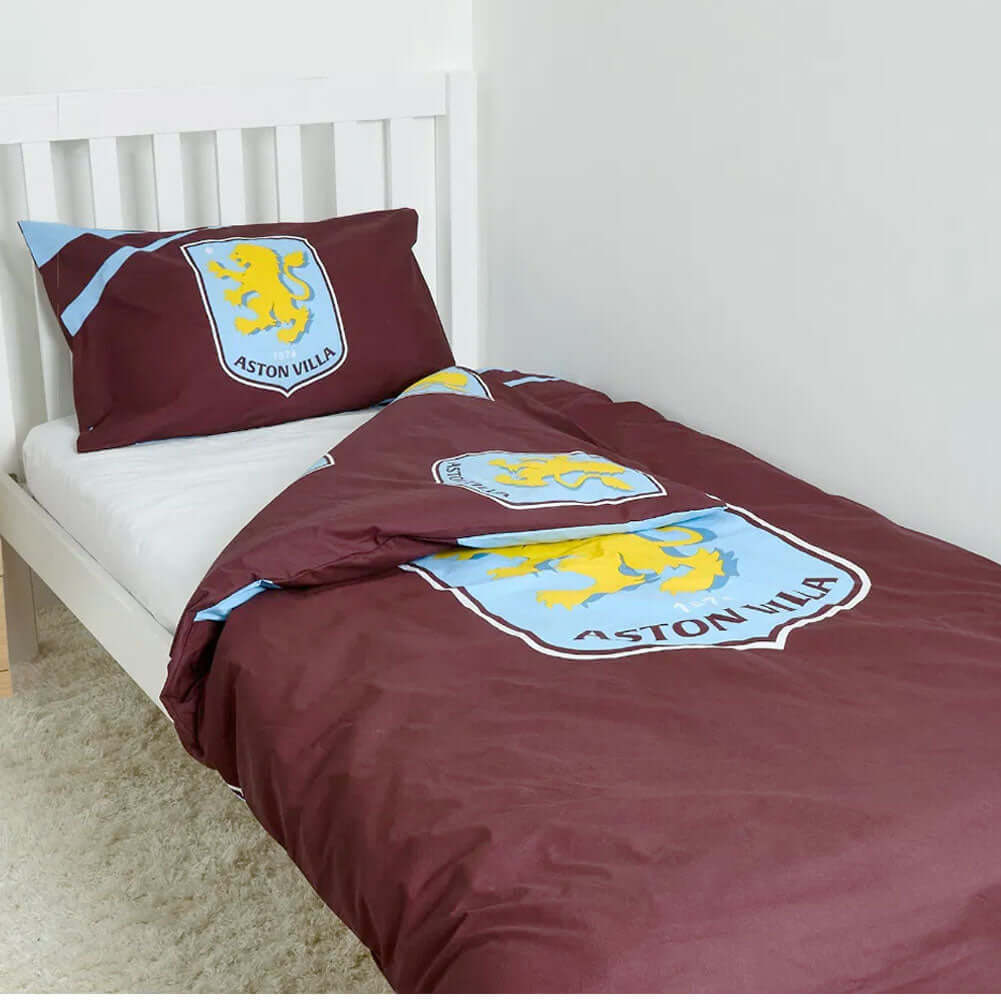 Aston Villa FC Single Duvet Set LKT Sport Vibrant claret and blue reversible duvet cover with a large Villa crestPillowcase features a large full colour club crestMulti crest design on the reverse52% polyester 48% cotton machine washableOfficial licensed