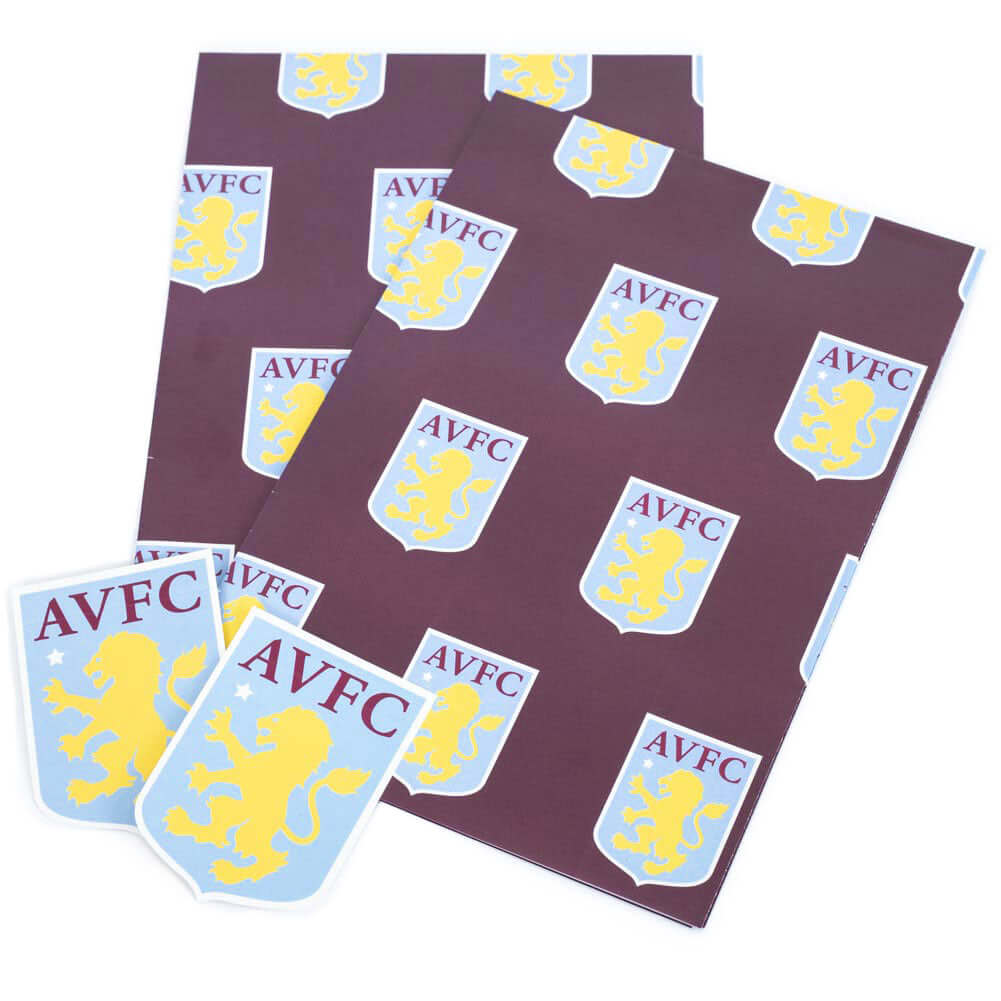 Aston Villa FC Text Gift Wrap LKT Sport Vibrant, colourful gift wrap sheets with tags2 sheets of wrap featuring multiple Aston Villa crests on a claret backgroundComplete with 2 sky blue gift tags featuring the Aston Villa crestOfficial licensed productAp Hauptbild