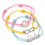 Barbie Friendship Bracelet Set LKT Sport Set of three Barbie Friendship Bracelets each one has a different charm true to BarbieBarbies logo, silhouette and glasses features on adjustable cord bracelets of pink, yellow and blueWear these bracelets stacked