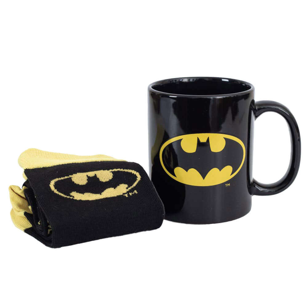 Batman Mug & Sock Set LKT Sport Classic mug and sock gift setSip and Step with Gotham's Guardian - Batman!Black mug and socks both featuring the iconic, vibrant yellow Batman logo designOfficial licensed productMug approx 315ml (11oz)Socks size 7-11 UK (4