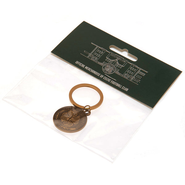 Celtic FC Antique Gold Crest Keyring LKT Sport Metal crest shaped keyring with chain and split ringDie stamped designMetal alloy with antique gold style finishOfficial licensed productApprox 30mm x 30mm Keychains