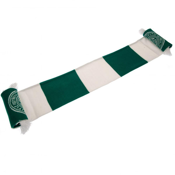 Celtic FC Bar Scarf LKT Sport Green and white bar stripe design jacquard knit scarf with white fringe Features a large Celtic club crest on both sides at each end Official licensed product Approx 132cm x 19cm On a header card Scarves