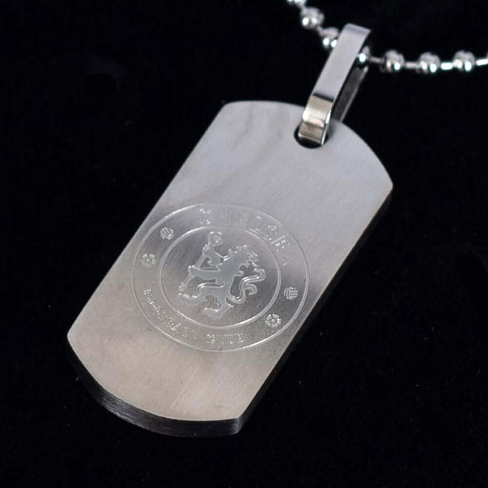 Chelsea FC Matt Finish Dog Tag & Chain LKT Sport Slim design stainless steel dog tag and ball chainMatt finish and engraved with the Chelsea crestOfficial licensed productChain approx 53cm (21in)Dog tag approx 30mm x 15mm Necklaces