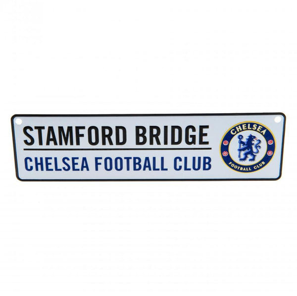 Chelsea FC Window Sign LKT Sport Design stamped metal window sign Stamford Bridge road sign, the home of Chelsea FC Ready to hang with rubber window suckers Official licensed product Approx 26cm x 7cm On a header card Novelty Signs