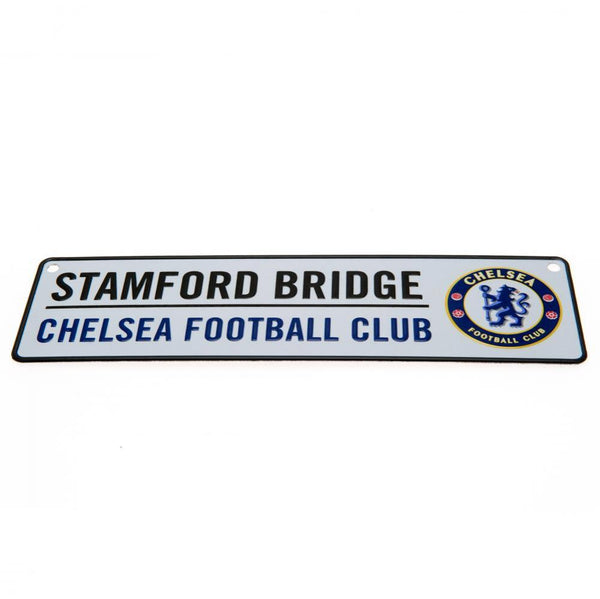 Chelsea FC Window Sign LKT Sport Design stamped metal window sign Stamford Bridge road sign, the home of Chelsea FC Ready to hang with rubber window suckers Official licensed product Approx 26cm x 7cm On a header card Novelty Signs