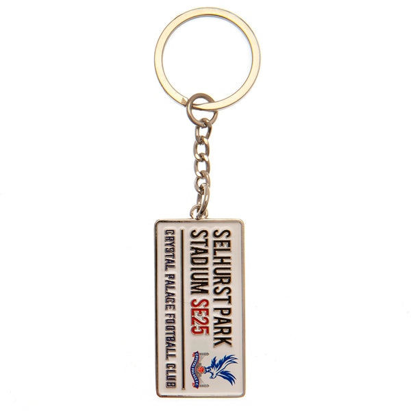 Crystal Palace FC Embossed Street Sign Keyring LKT Sport Embossed metal rectangular keyring with chain and split ringFull colour enamel finish featuring street sign designMetal alloy with silver style finishOfficial licensed productApprox 50mm x 25mm Keyc