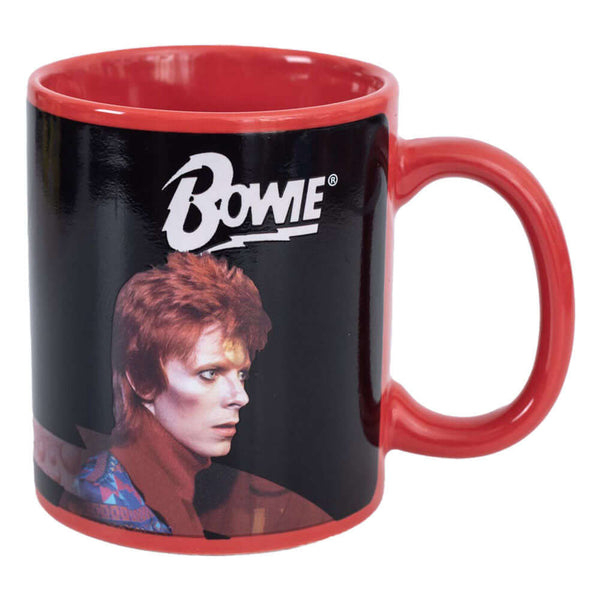 David Bowie Heat Changing Mug LKT Sport Ceramic everyday coffee mug with a heat sensitive designDesign changes as the contents heat and coolRed mug featuring the Bowie logo and two images of Bowie which appear together when hotHand wash onlyOfficial licen