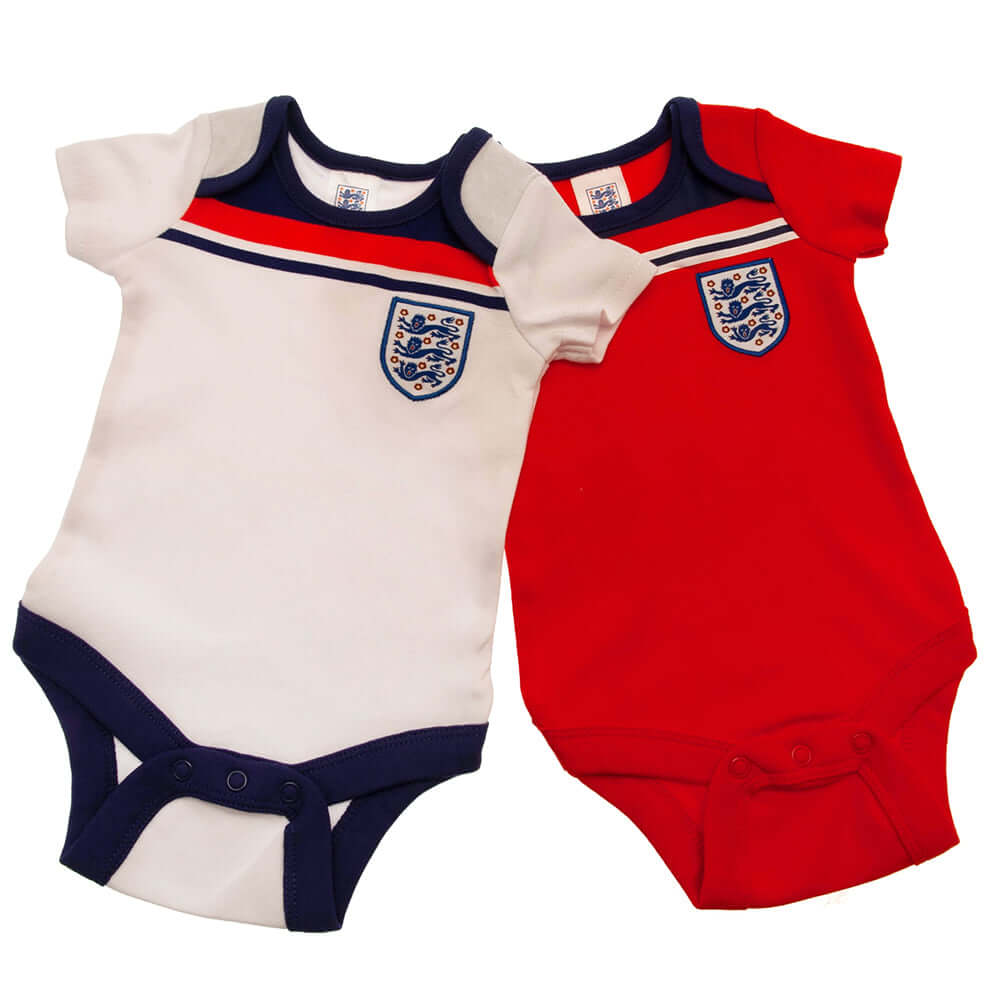 England FA 2 Pack Bodysuit 82 Retro 12-18 Mths LKT Sport This short sleeved bodysuit comes in a multi design twin packDesign inspired by the 1982 world cup kit with an embroidered crestSoft comfortable fit with press stud fasteningMade from 100% CottonOff