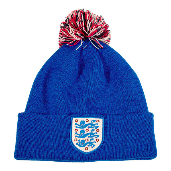 England FA Royal Blue Ski Hat LKT Sport Royal blue cuff knit beanie bobble hatFeatures a multi colour bobble with a woven England crestOfficial licensed productOne size fits all Beanies